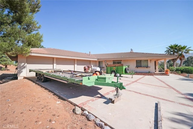6020 Valley Sage Rd, Acton, CA 93510 - back of house with a tiled roof and stucco siding