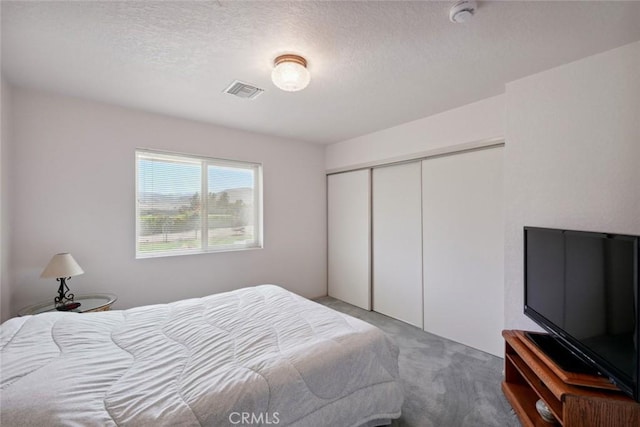 6020 Valley Sage Rd, Acton, CA 93510 - carpeted bedroom with a closet and a textured ceiling