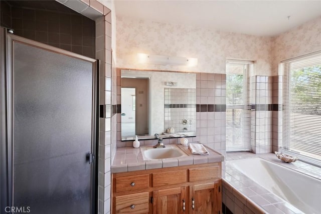 6020 Valley Sage Rd, Acton, CA 93510 - bathroom featuring wallpapered walls, vanity, a bath, and a stall shower