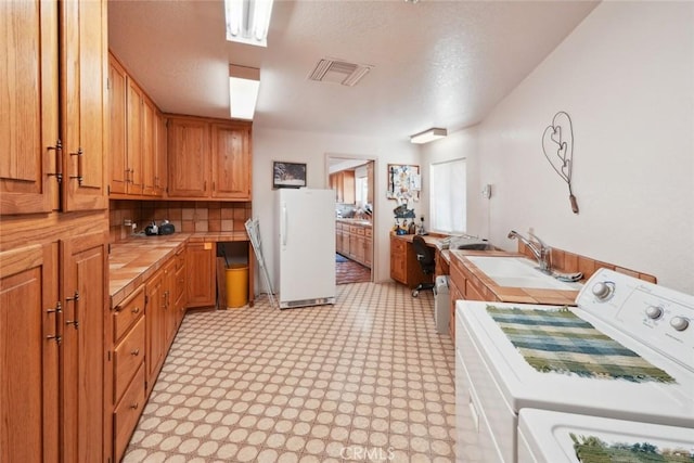 6020 Valley Sage Rd, Acton, CA 93510 - laundry area featuring washer / dryer and light floors