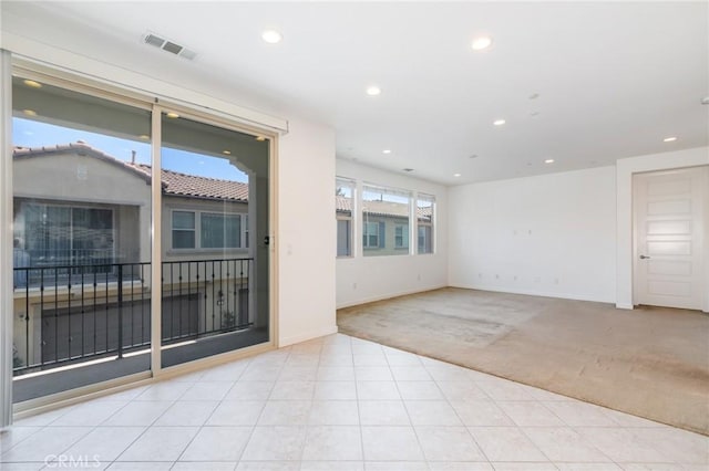 16 Agave, Lake Forest, CA 92630 - empty room featuring light carpet, recessed lighting, and light tile patterned flooring