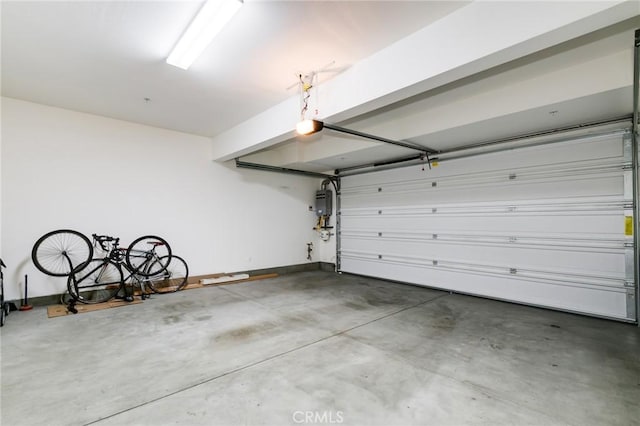 16 Agave, Lake Forest, CA 92630 - garage with a garage door opener and water heater