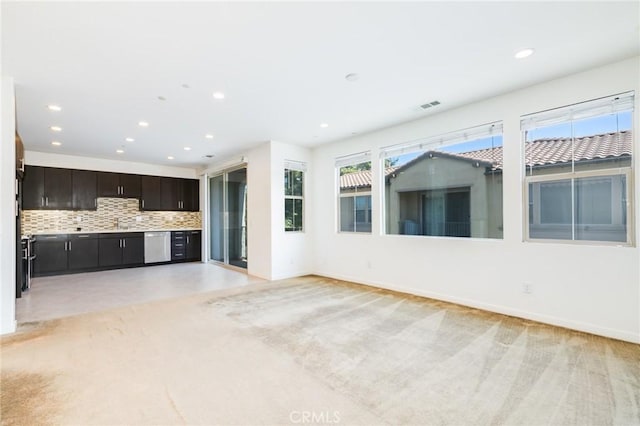 16 Agave, Lake Forest, CA 92630 - unfurnished living room featuring recessed lighting and light colored carpet