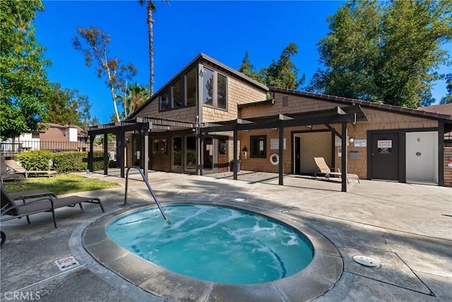 779 Via Sierra Nevada, Riverside, CA 92507 - rear view of house featuring a hot tub and a patio