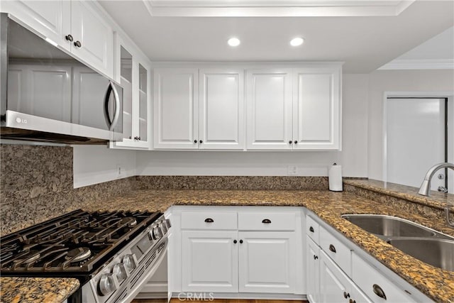779 Via Sierra Nevada, Riverside, CA 92507 - kitchen with appliances with stainless steel finishes, white cabinets, glass insert cabinets, crown molding, and recessed lighting
