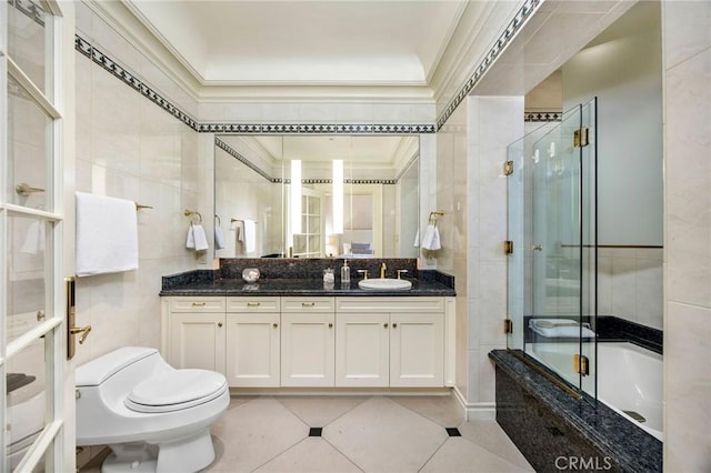 1129 Via Mirabel, Palos Verdes Estates, CA 90274 - bathroom featuring tile walls, vanity, tile patterned floors, crown molding, and tiled shower / bath combo