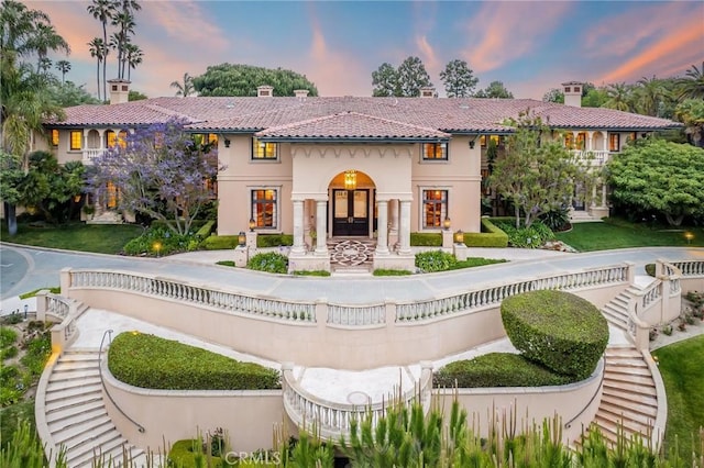 1129 Via Mirabel, Palos Verdes Estates, CA 90274 - back of house featuring a chimney, stucco siding, and a tile roof