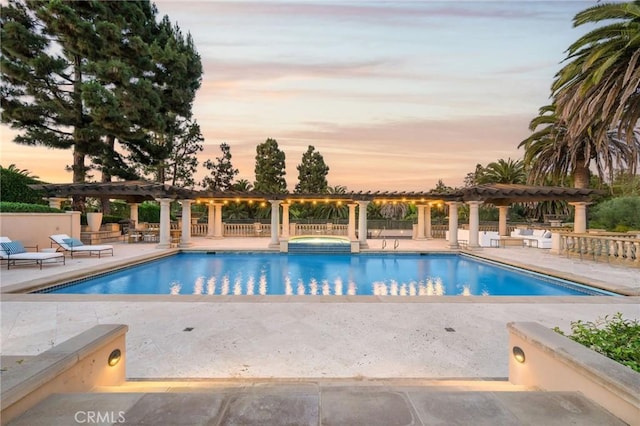 1129 Via Mirabel, Palos Verdes Estates, CA 90274 - pool at dusk with a pergola, an in-ground hot tub, and a patio area