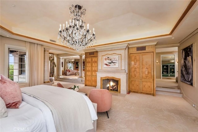 1129 Via Mirabel, Palos Verdes Estates, CA 90274 - bedroom with a raised ceiling, a chandelier, light colored carpet, a fireplace, and ornamental molding