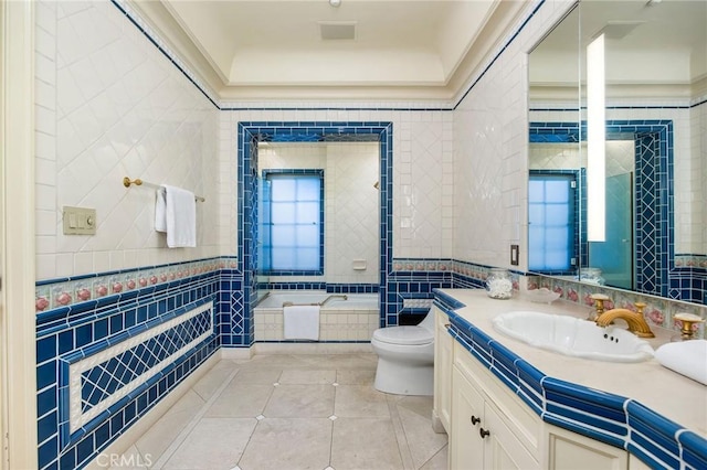 1129 Via Mirabel, Palos Verdes Estates, CA 90274 - full bath with tile walls, tile patterned floors, a relaxing tiled tub, and vanity