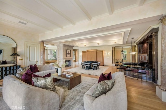 1129 Via Mirabel, Palos Verdes Estates, CA 90274 - living area featuring wood finished floors, healthy amount of natural light, crown molding, and beam ceiling