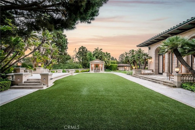 1129 Via Mirabel, Palos Verdes Estates, CA 90274 - yard at dusk with a gazebo and a lawn