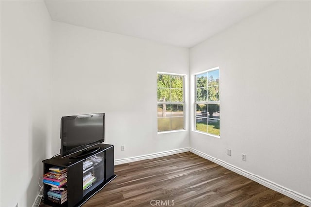 27545 Wellsley Way, Valencia, CA 91354 - unfurnished living room with dark wood-style flooring and baseboards
