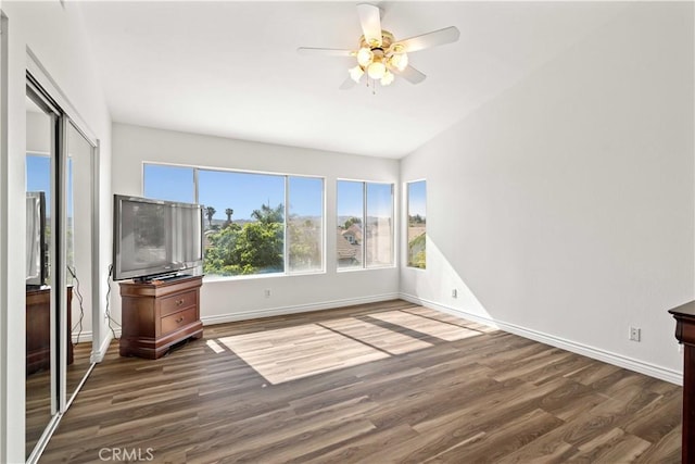 27545 Wellsley Way, Valencia, CA 91354 - unfurnished living room with wood finished floors and a ceiling fan