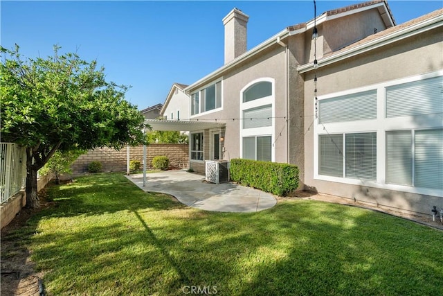 27545 Wellsley Way, Valencia, CA 91354 - back of house with stucco siding, a patio, a pergola, a fenced backyard, and a chimney