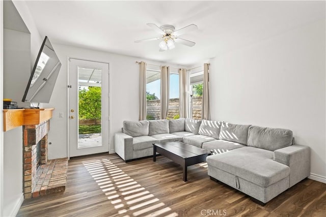 27545 Wellsley Way, Valencia, CA 91354 - living area with ceiling fan, wood finished floors, and a brick fireplace