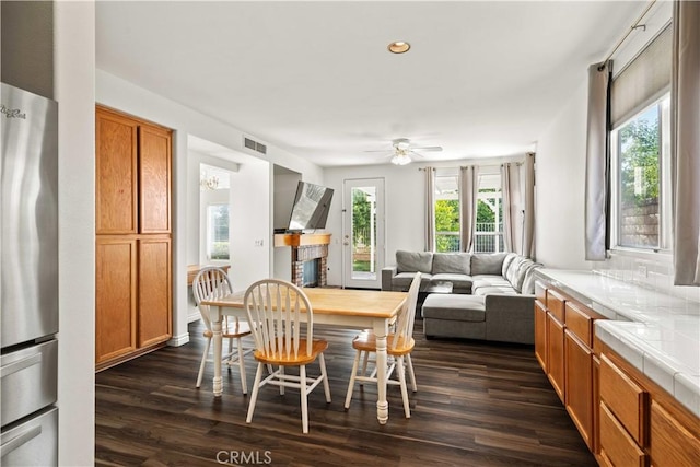 27545 Wellsley Way, Valencia, CA 91354 - dining room with dark wood-style flooring, ceiling fan, and recessed lighting