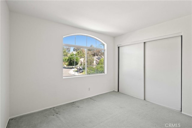 27545 Wellsley Way, Valencia, CA 91354 - unfurnished bedroom featuring carpet flooring and a closet