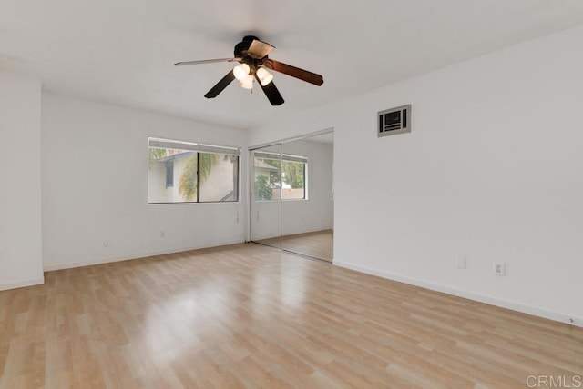 3414 Del Este Way, Oceanside, CA 92056 - empty room featuring light wood finished floors and ceiling fan