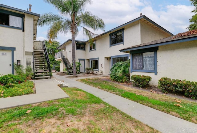3414 Del Este Way, Oceanside, CA 92056 - view of property featuring stairway and stucco siding