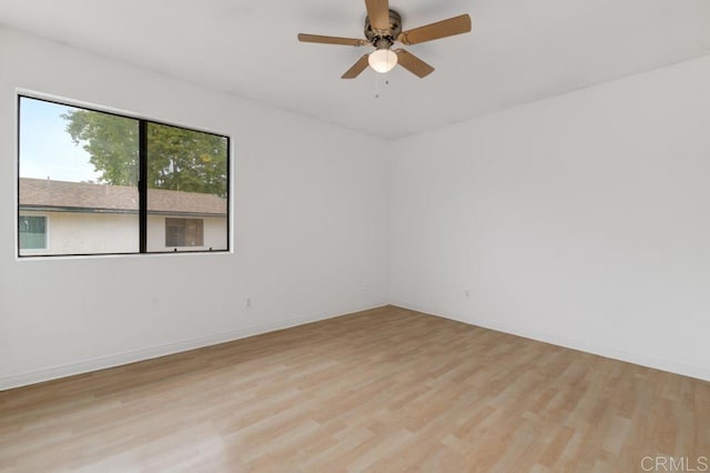 3414 Del Este Way, Oceanside, CA 92056 - empty room with light wood-style floors and a ceiling fan