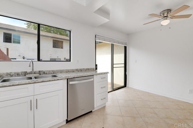 3414 Del Este Way, Oceanside, CA 92056 - kitchen featuring stainless steel dishwasher, white cabinetry, a ceiling fan, light countertops, and light tile patterned floors