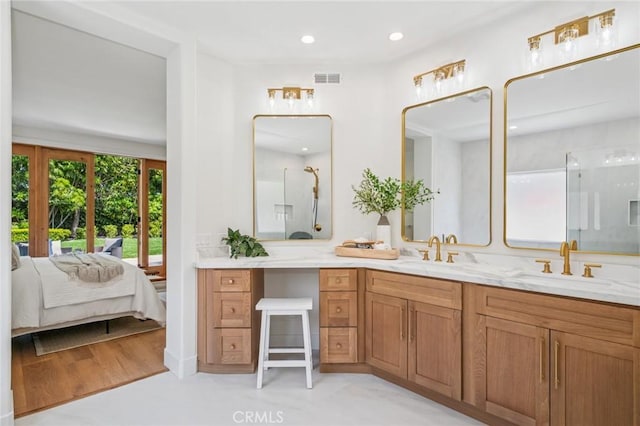 38 San Raphael, Dana Point, CA 92629 - ensuite bathroom with a shower stall, double vanity, and recessed lighting
