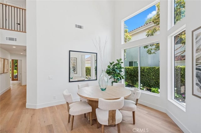 38 San Raphael, Dana Point, CA 92629 - dining space featuring a high ceiling, light wood-style flooring, and plenty of natural light
