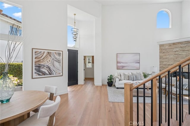 38 San Raphael, Dana Point, CA 92629 - foyer entrance with a high ceiling, light wood-style flooring, and stairs