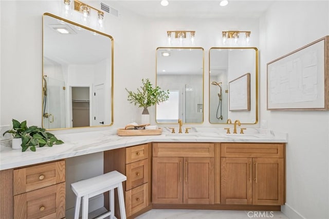 38 San Raphael, Dana Point, CA 92629 - bathroom featuring a shower with shower door, double vanity, and recessed lighting
