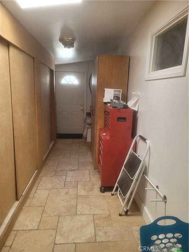 15845 La Vida Dr, Palm Springs, CA 92262 - hallway with stone tile floors