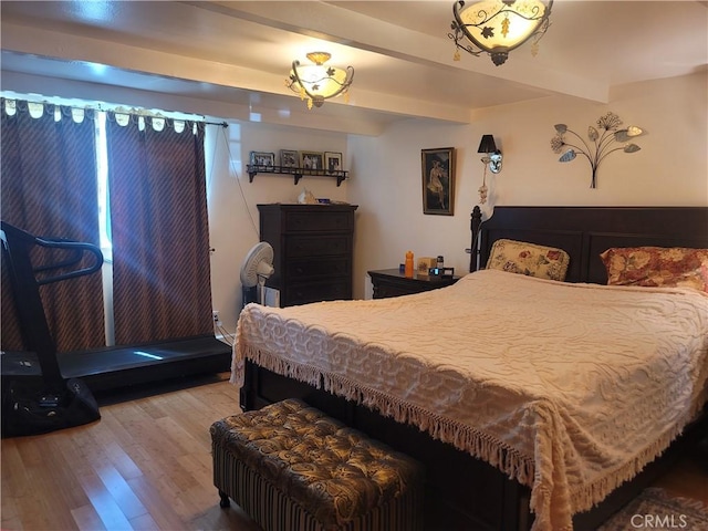 15845 La Vida Dr, Palm Springs, CA 92262 - bedroom with wood finished floors and beam ceiling