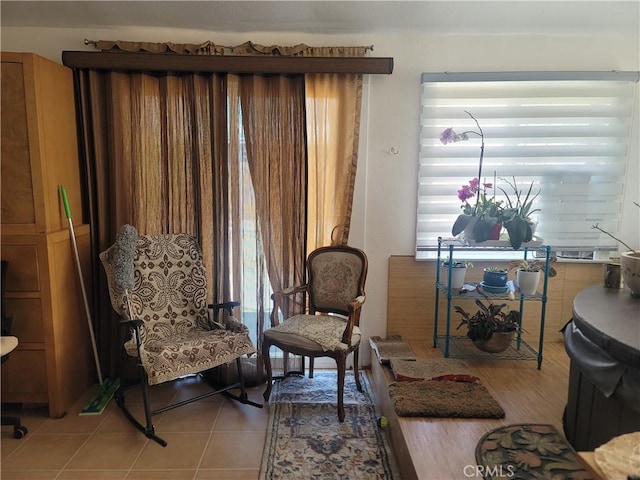15845 La Vida Dr, Palm Springs, CA 92262 - living area featuring light tile patterned flooring