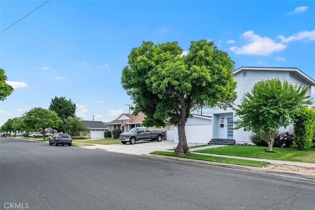 21225 Kent Ave, Torrance, CA 90503 - obstructed view of property featuring a front lawn and stucco siding