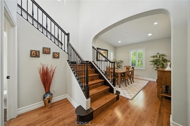 72 Shade Tree, Irvine, CA 92603 - stairway with arched walkways, hardwood / wood-style flooring, and recessed lighting