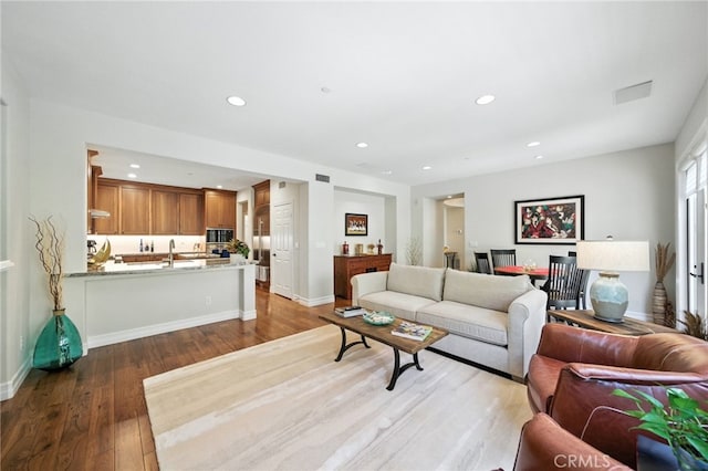 72 Shade Tree, Irvine, CA 92603 - living room with recessed lighting and wood finished floors
