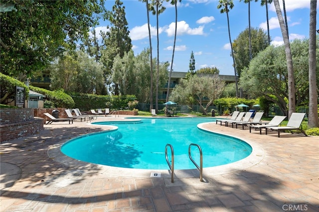 564 N Bellflower Blvd Unit 105, Long Beach, CA 90814 - community pool featuring a patio area