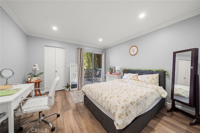 564 N Bellflower Blvd Unit 105, Long Beach, CA 90814 - bedroom featuring access to exterior, ornamental molding, wood finished floors, and recessed lighting