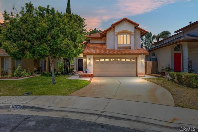 11142 Malone St, Rancho Cucamonga, CA 91701 - mediterranean / spanish-style house featuring a tile roof, stucco siding, and driveway