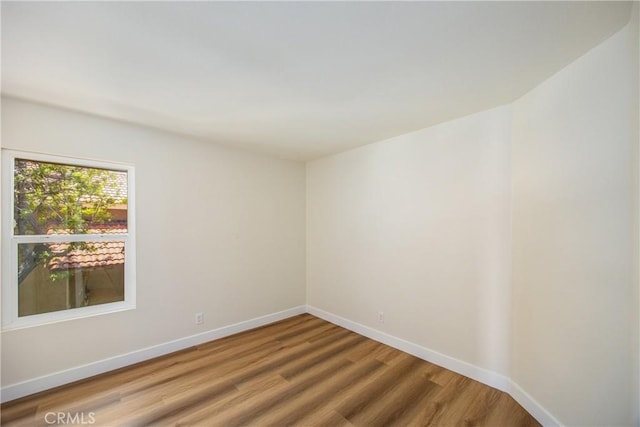 11142 Malone St, Rancho Cucamonga, CA 91701 - unfurnished room with wood finished floors and baseboards