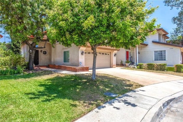 11142 Malone St, Rancho Cucamonga, CA 91701 - view of property hidden behind natural elements with concrete driveway, stucco siding, a front lawn, and an attached garage