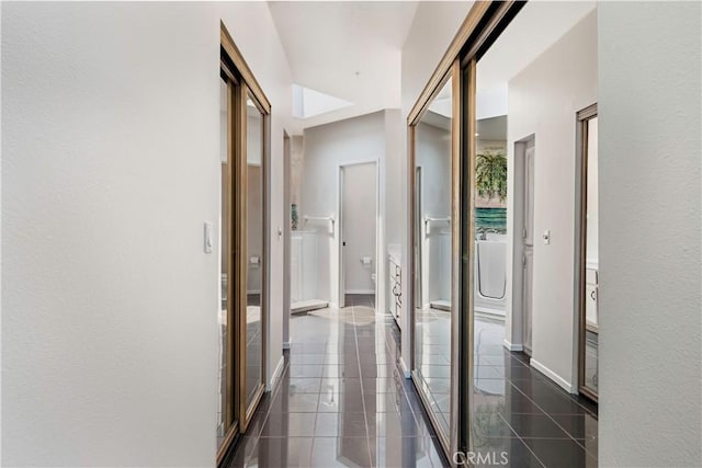 2604 E 20th St Unit 304, Signal Hill, CA 90755 - corridor featuring baseboards