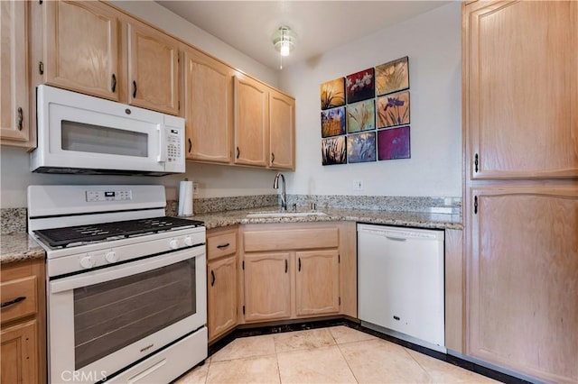 2604 E 20th St Unit 304, Signal Hill, CA 90755 - kitchen with white appliances, light brown cabinetry, light stone countertops, and light tile patterned floors