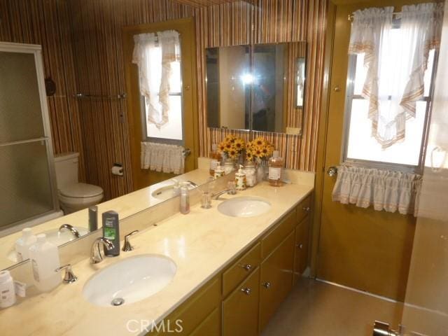 15411 Runnymede St, Van Nuys, CA 91406 - full bathroom featuring double vanity and an enclosed shower