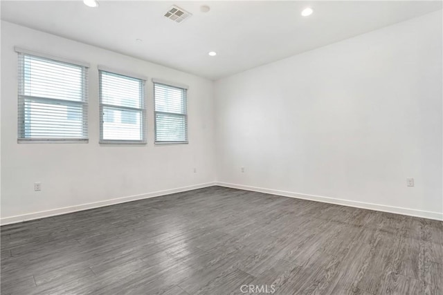 13219 Shaw Ln, Sylmar, CA 91342 - empty room with dark wood finished floors and recessed lighting