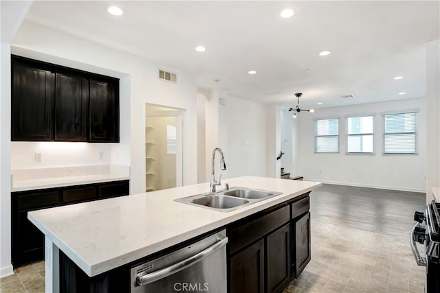 13219 Shaw Ln, Sylmar, CA 91342 - kitchen with dishwasher, a kitchen island with sink, open floor plan, gas stove, and recessed lighting