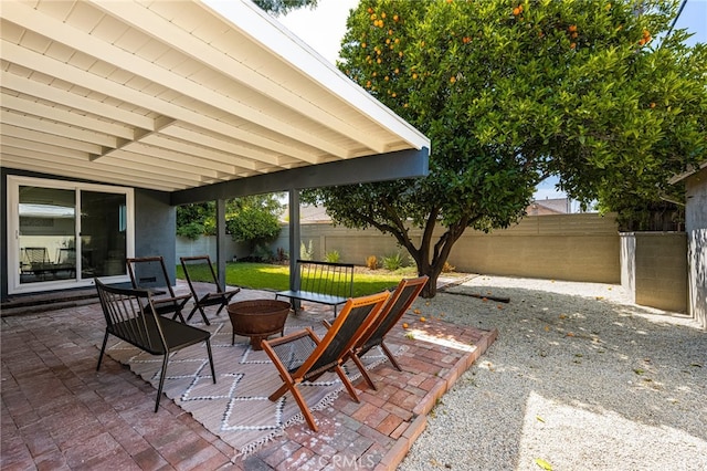 17216 Lorne St, Van Nuys, CA 91406 - fenced backyard with a fire pit and a patio area