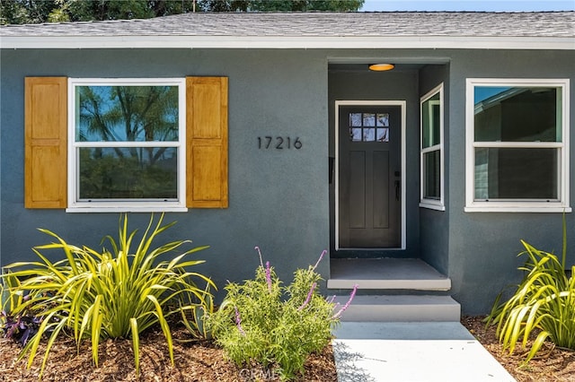 17216 Lorne St, Van Nuys, CA 91406 - property entrance with stucco siding and roof with shingles