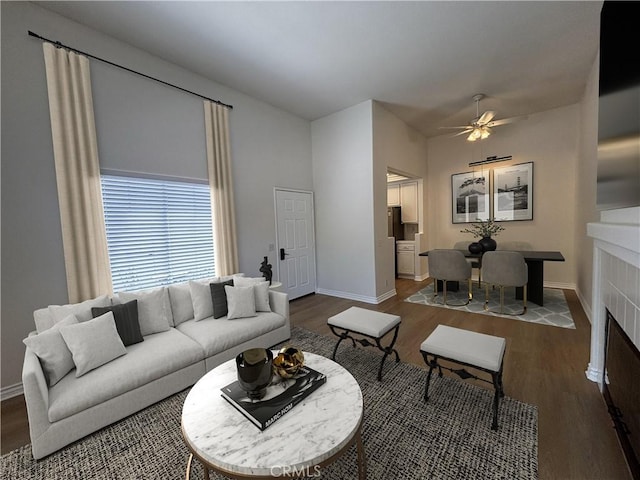 28741 La Triana, Laguna Niguel, CA 92677 - living area featuring dark wood-type flooring, a ceiling fan, and a tiled fireplace