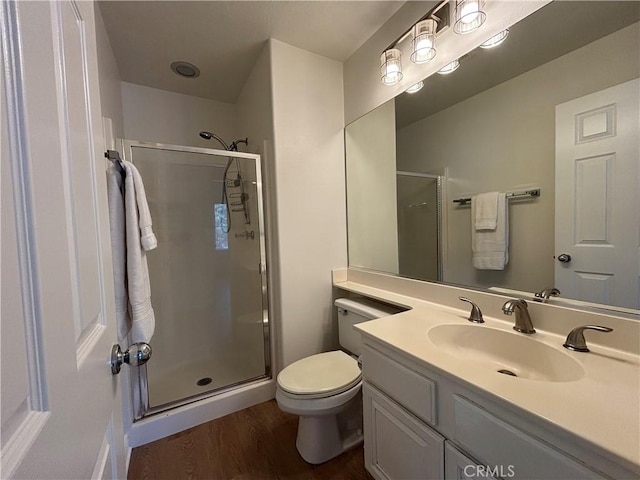 28741 La Triana, Laguna Niguel, CA 92677 - bathroom with a stall shower, wood finished floors, and vanity
